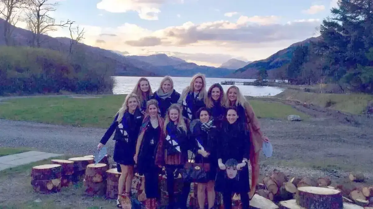 The hen party posed by the water for some snaps during their break in Scotland (X/@hollydca)