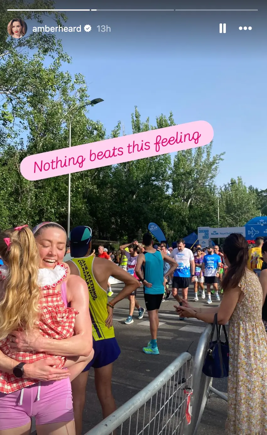 Heard embraces her daughter after finishing the race (Instagram/Amber Heard)