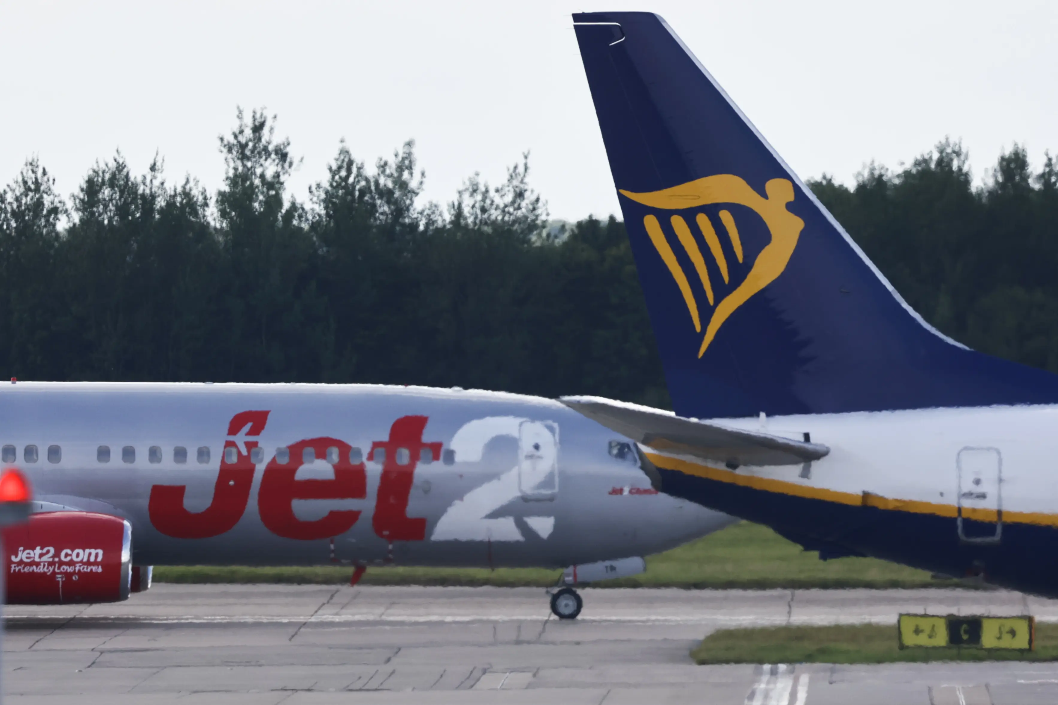 Warnings have been issued from both airlines (Jakub Porzycki/NurPhoto via Getty Images)