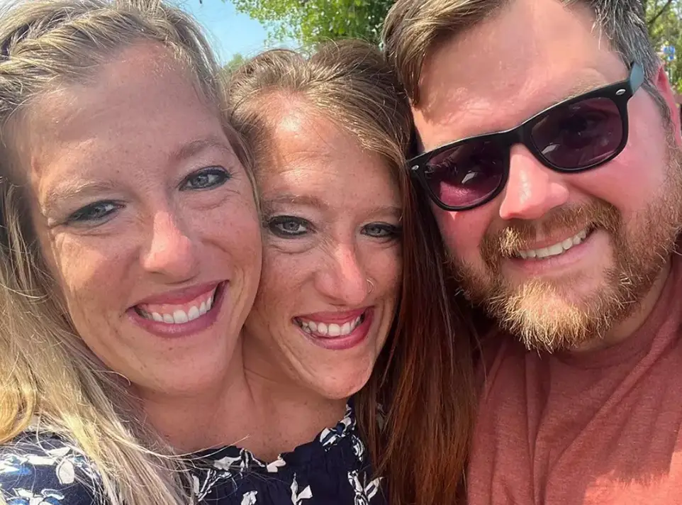 Conjoined twins, Abby and Brittany Hensel, have grown up with a ton of media attention (Facebook)