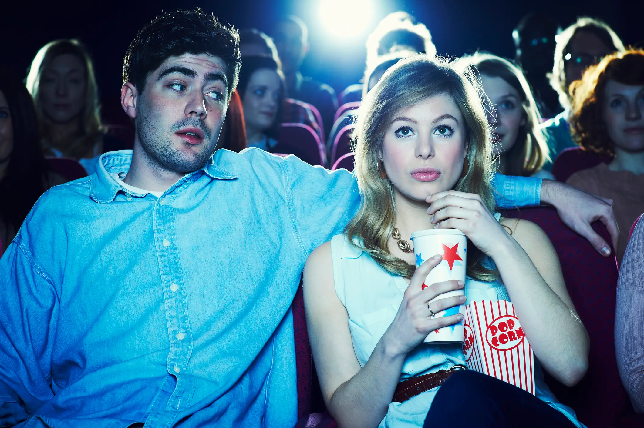 "Should I... should we?" "Shut up and watch the movie. We can have a proper conversation about it afterwards." (Getty Stock Photo)
