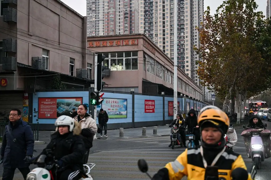The argument that Covid originated from a wholesale meat market in China is widely accepted as the origin for the virus (HECTOR RETAMAL/AFP via Getty Images)