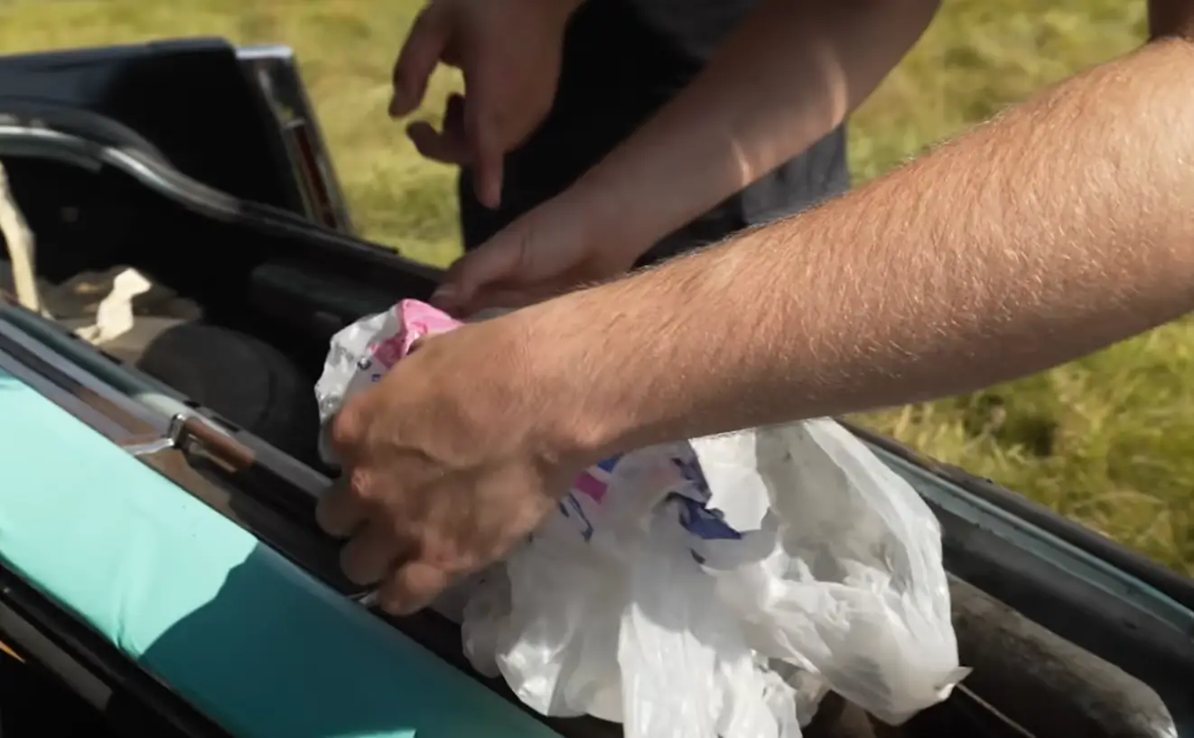 The pair find blood on a plastic bag (YouTube/Top Dead Center)