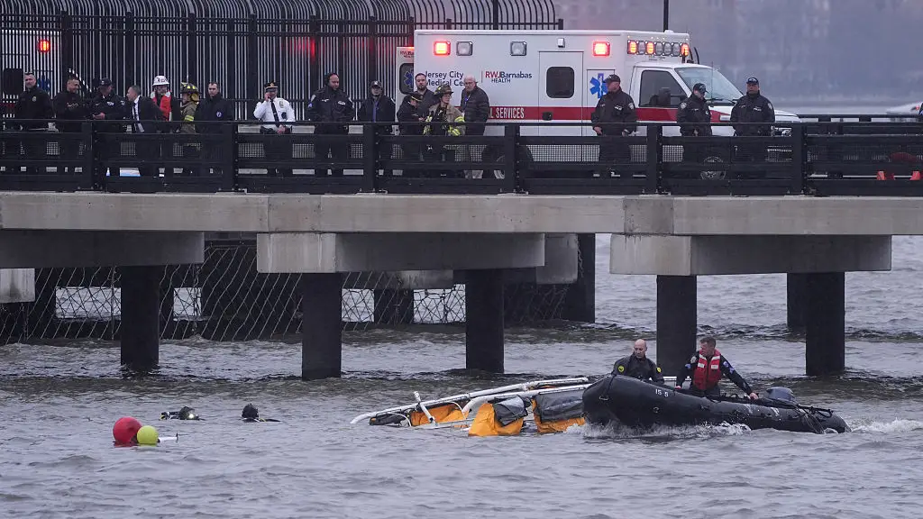 Helicopter pilot made radio call warning before crash into New York's Hudson River killing six on board