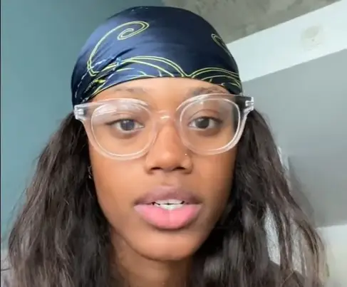 The woman managed to get the homeless man to leave by stepping out and asking him to leave while she was gone.