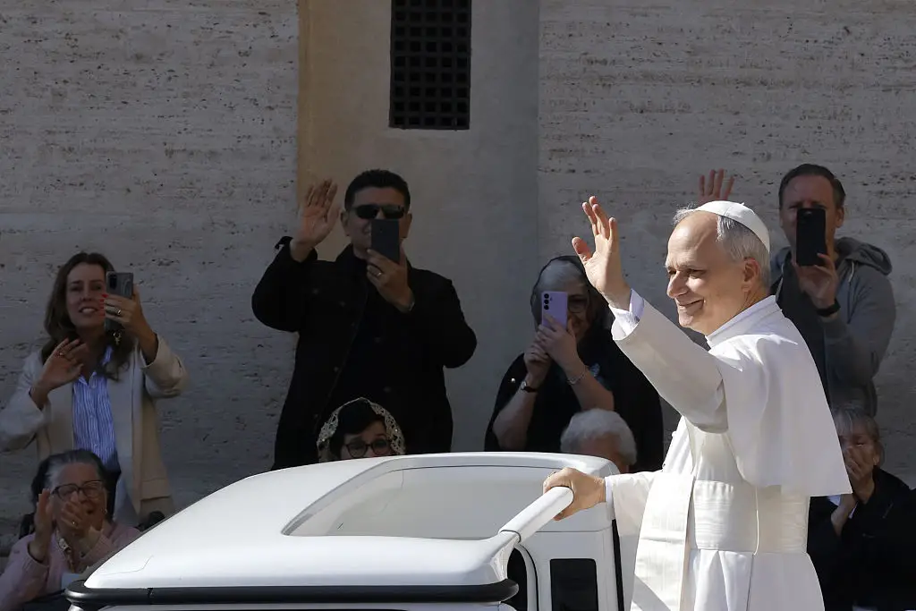 Pope Leo XIV greeted crowds from his popemobile ahead of the inaugural mass (Riccardo De Luca/Anadolu via Getty Images)