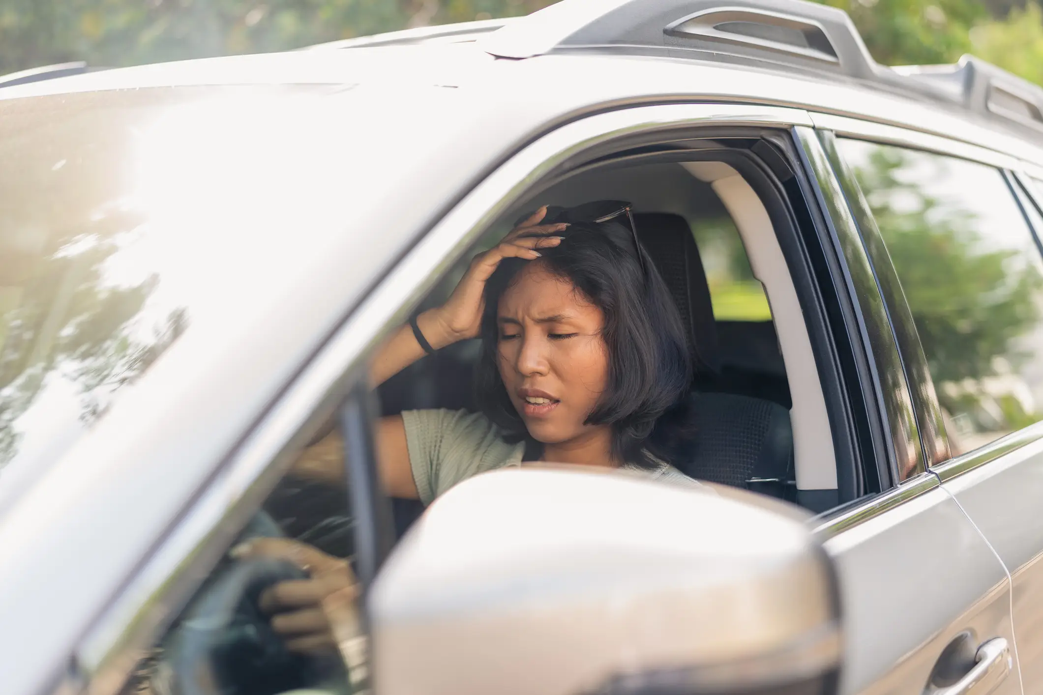 Getting out of the heat into an even hotter car can be one of the worst feelings going (Getty Stock Image)