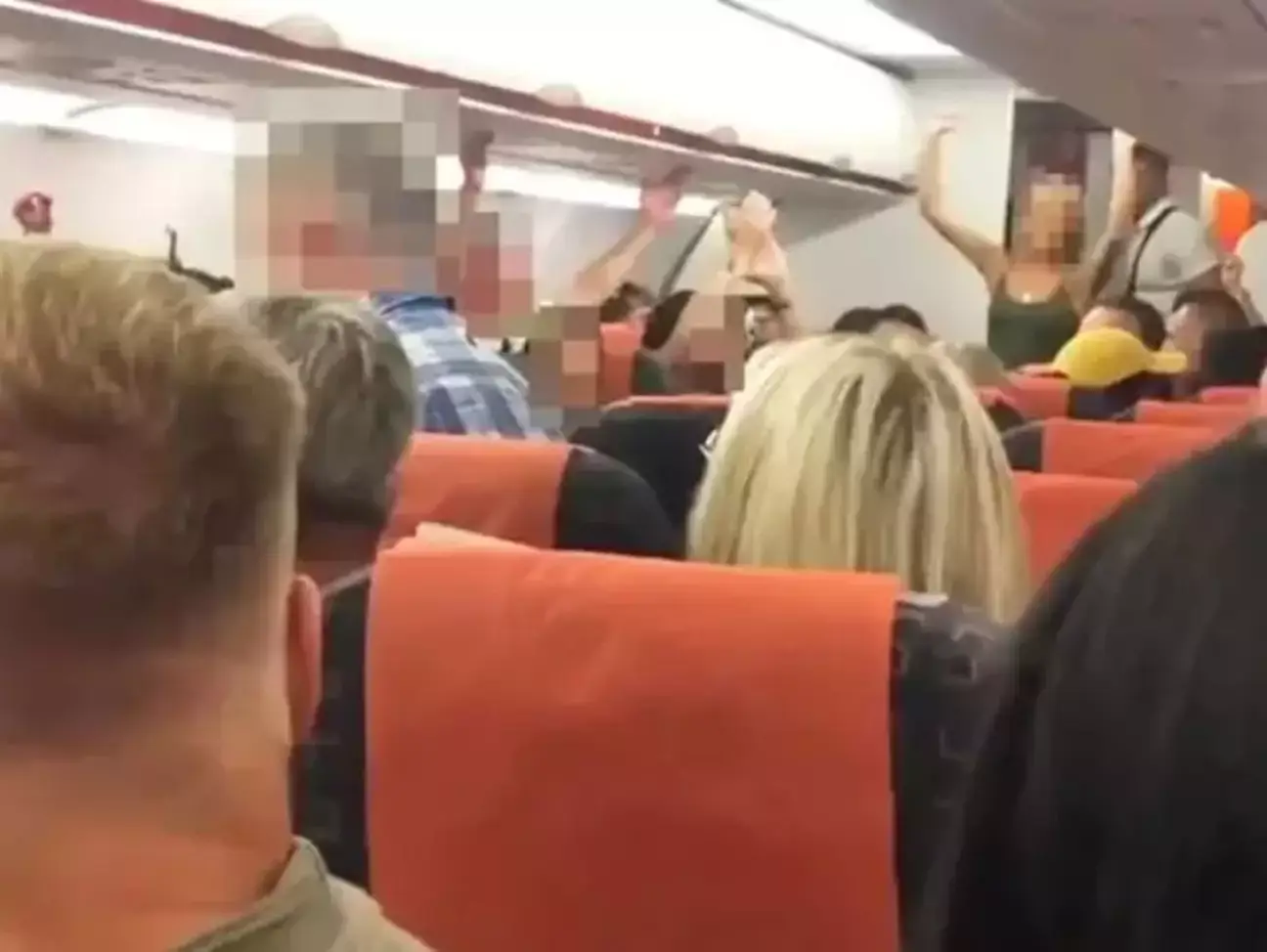 The pair were cheered as they returned to their seats.