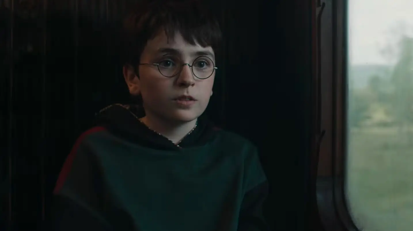 McLaughlin seen in the first official teaser trailer as Harry Potter (HBO)