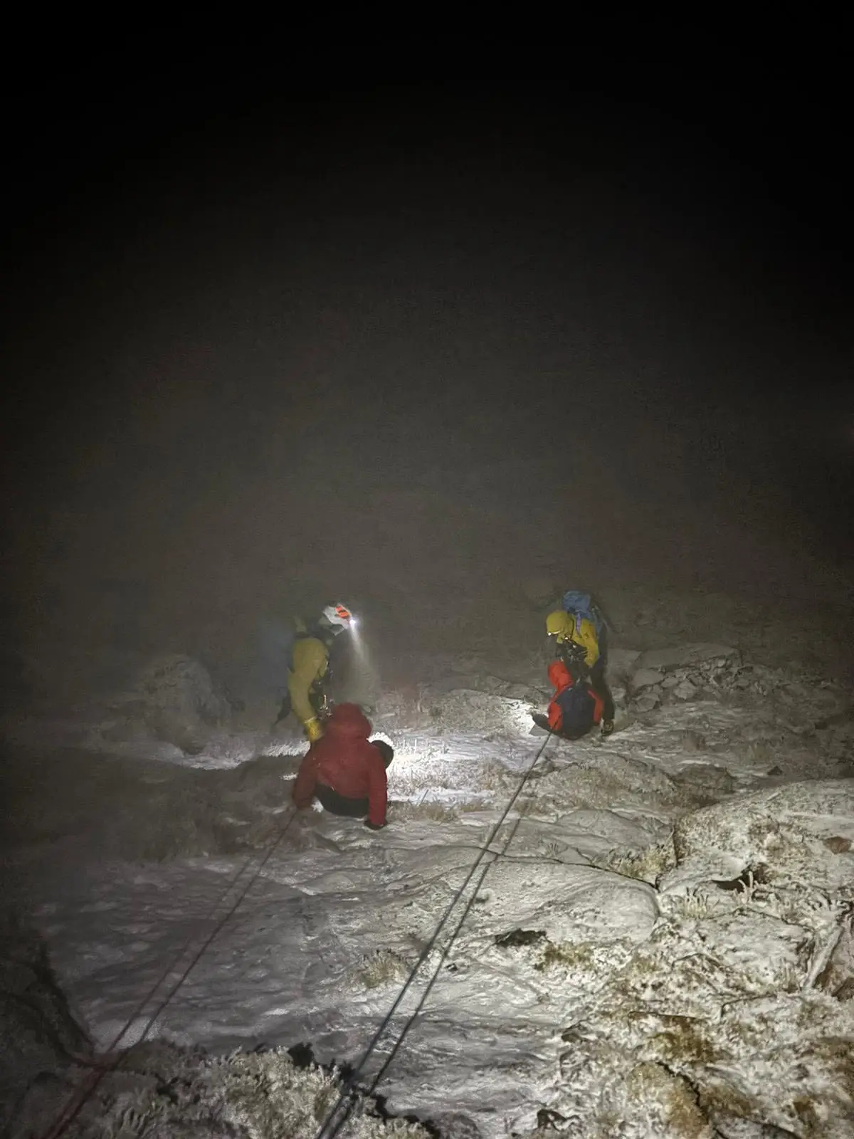 Two men wearing trainers and jogging bottoms tried to climb a mountain at 6pm in winter, less than three hours later mountain rescue was called to help (Cairngorm Mountain Rescue Team/Facebook)