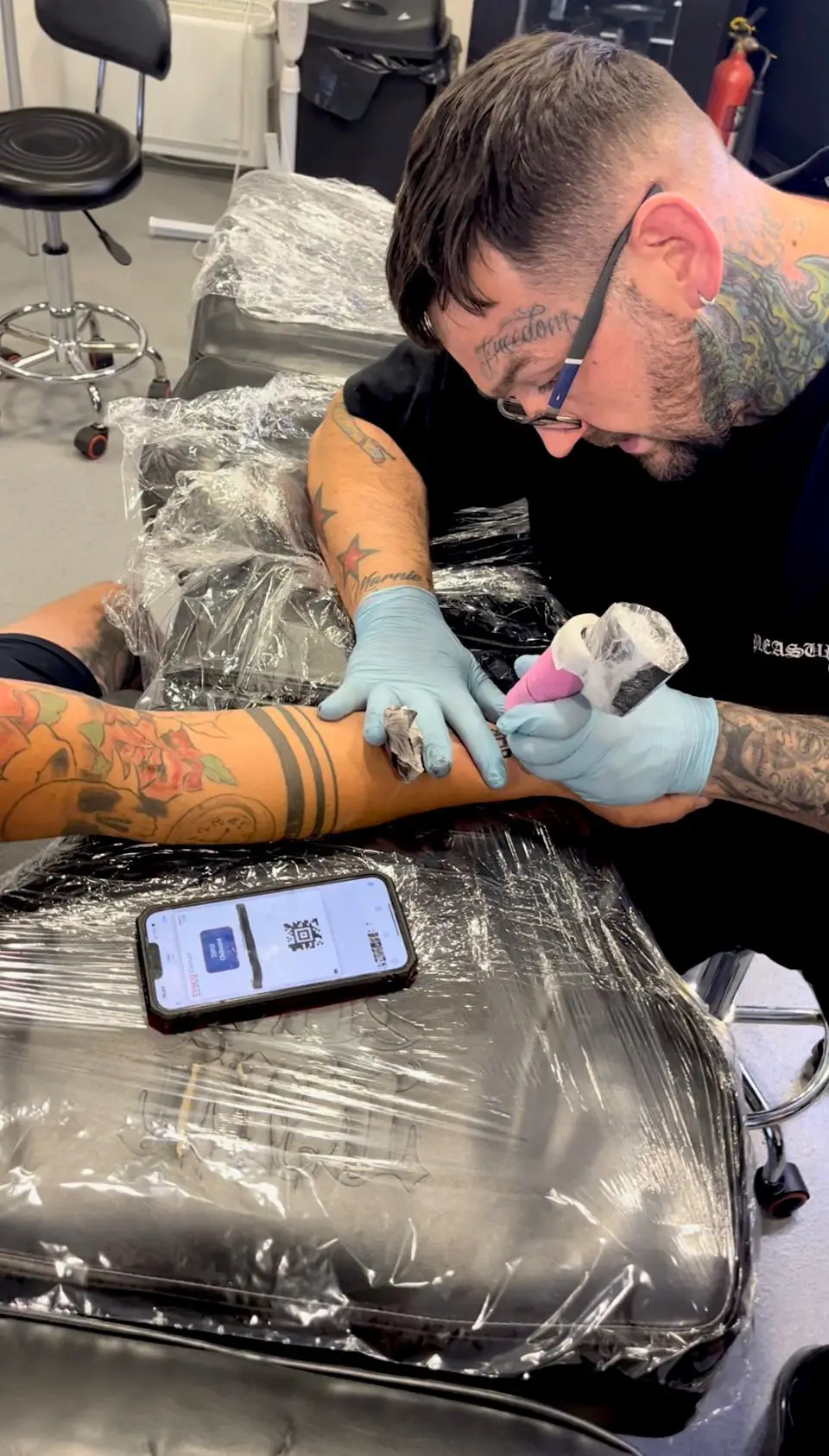 The dad-of-seven decided to get his Tesco Clubcard etched onto his skin permanently.