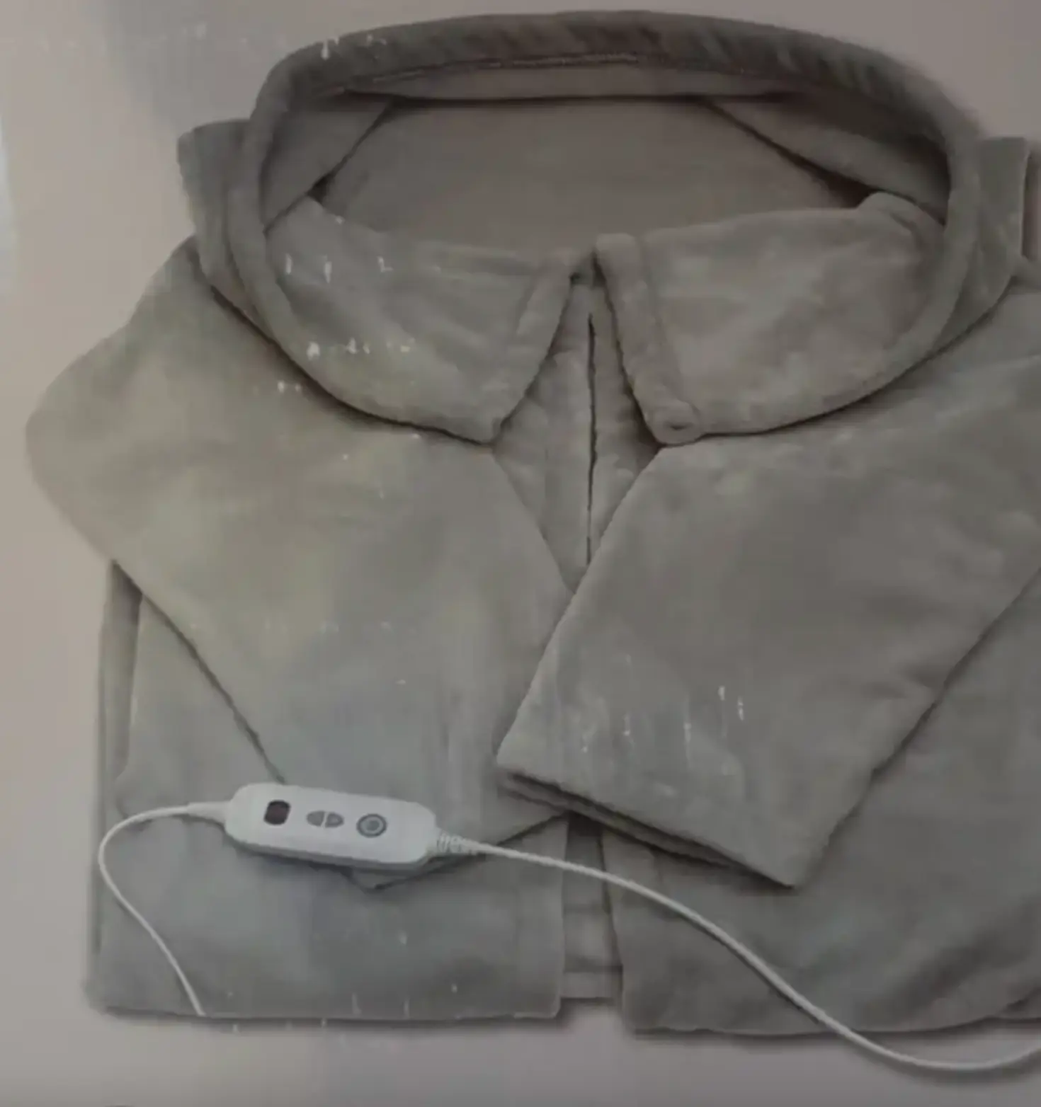 Aldi's wearable heated throw is a must this winter.