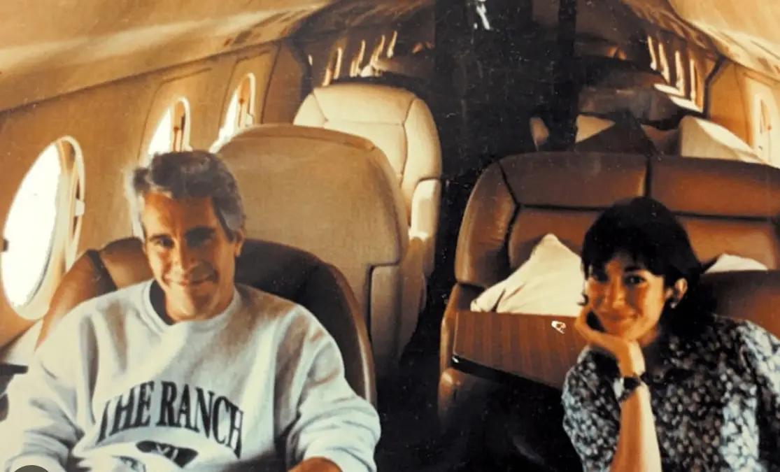 A snap shows the sex offender and his accomplice Ghislaine Maxwell on a flight together (US Department of Justice)