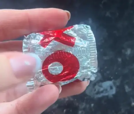 Crush it until it looks like this, then tear off a corner and pour.