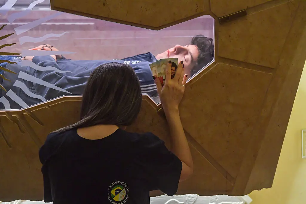 Worshippers visiting the tomb of Carlo Acutis in Assisi (Laura Lezza/Getty Images)