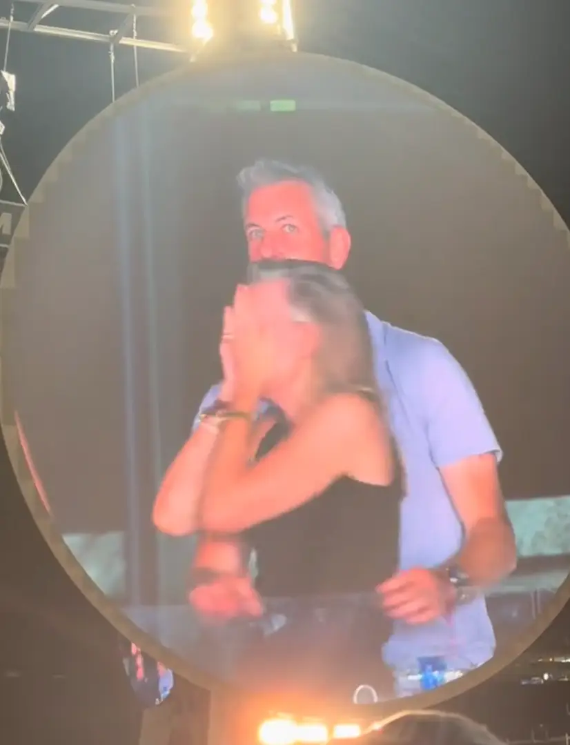 The pair hid after being caught cuddling on the big screen (TikTok/Instaagraace)
