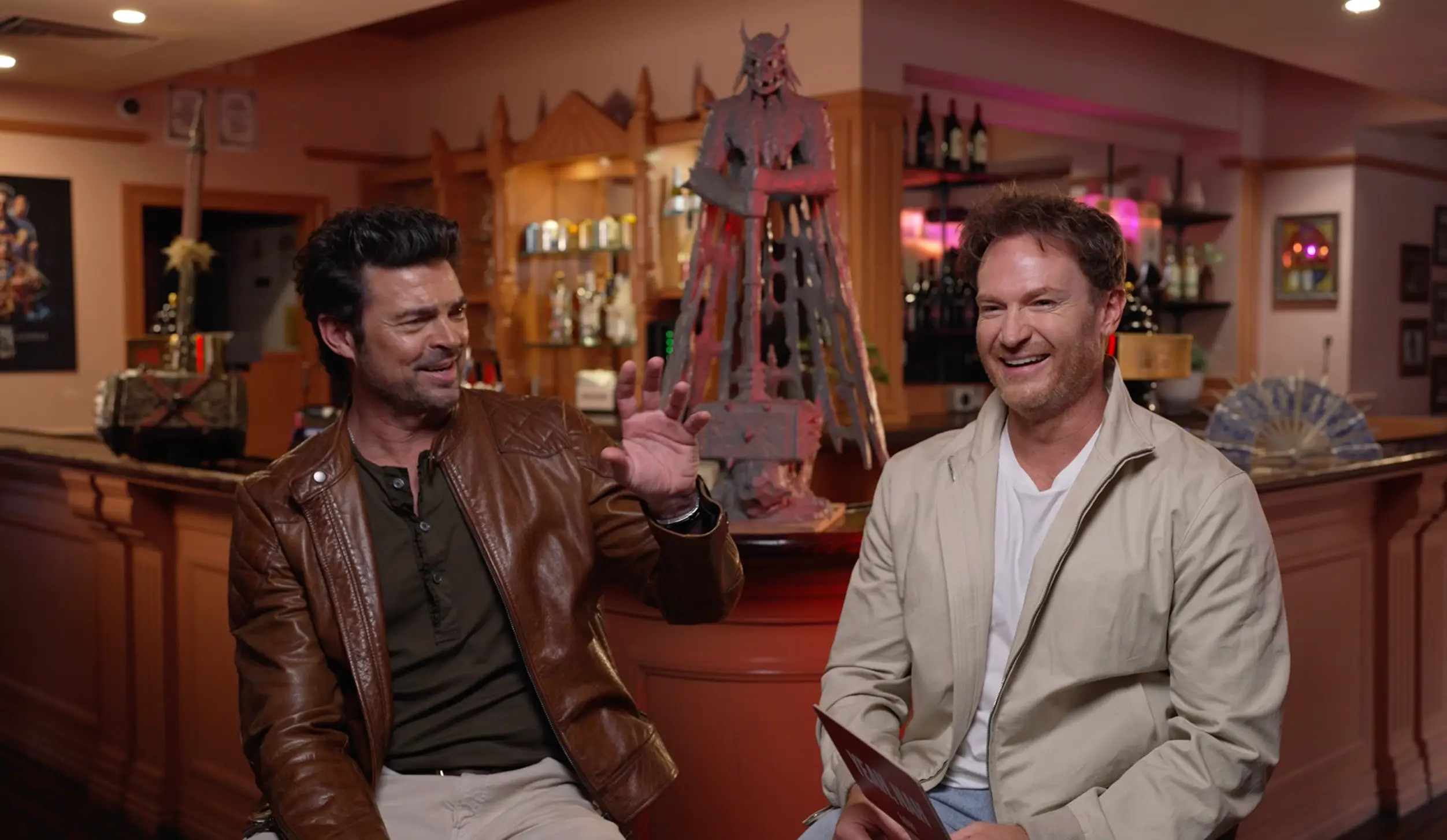 Josh Lawson and Karl Urban sit down with LADbible Australia at Dirty Harry's Bar in Movie World, Warner Bros. 