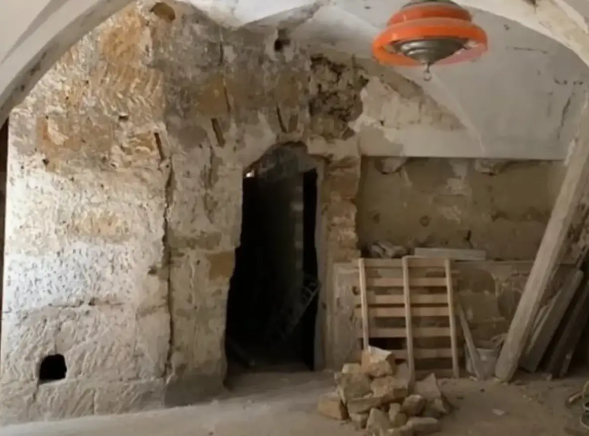 The house needed a lot of work but now it's a modern holiday home with its own sauna (YouTube/CNBC Make It)