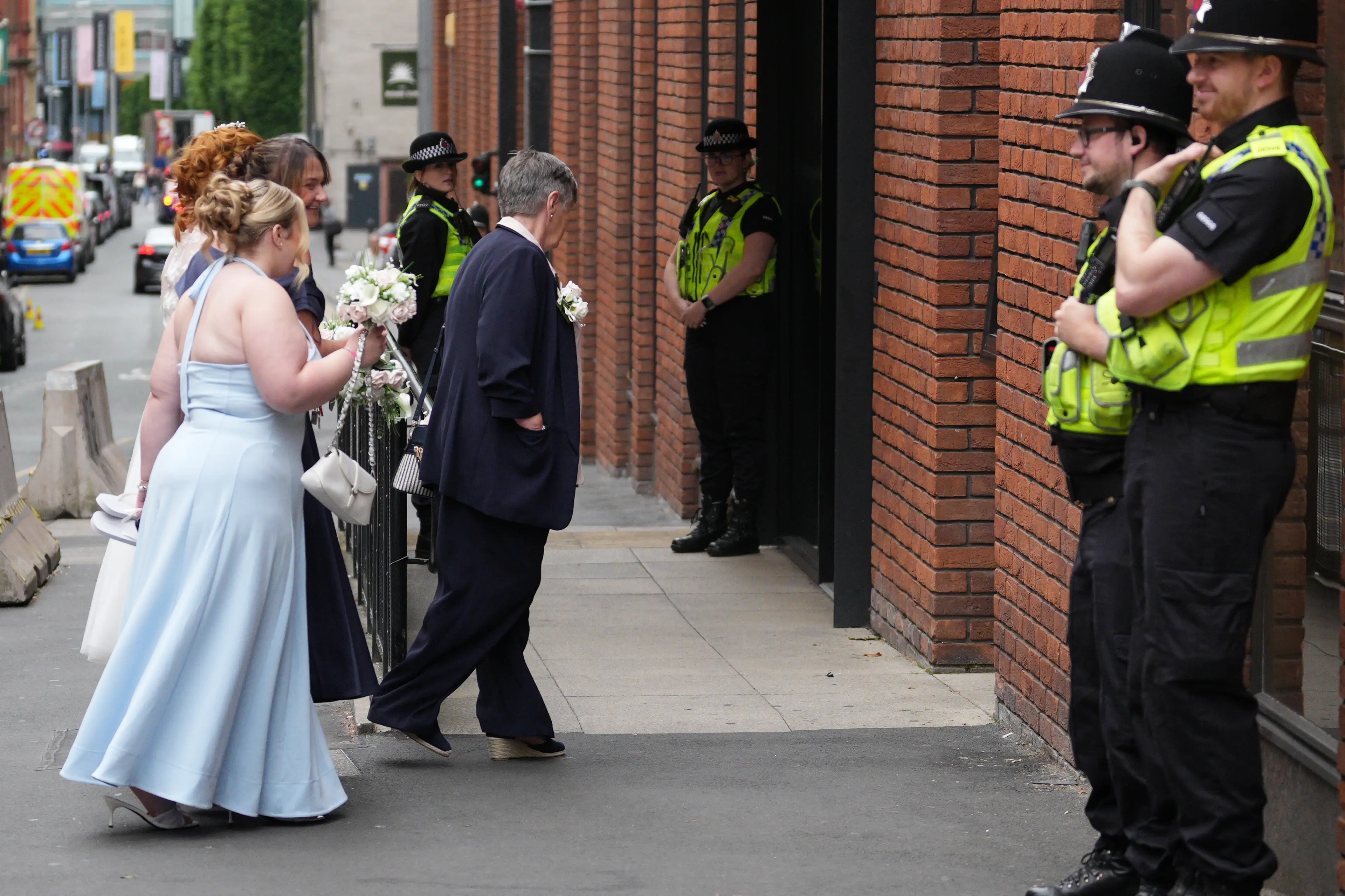 A host of wedding parties have been photobombed by coppers stationed outside of No 10 North (Christopher Furlong/Getty Images)