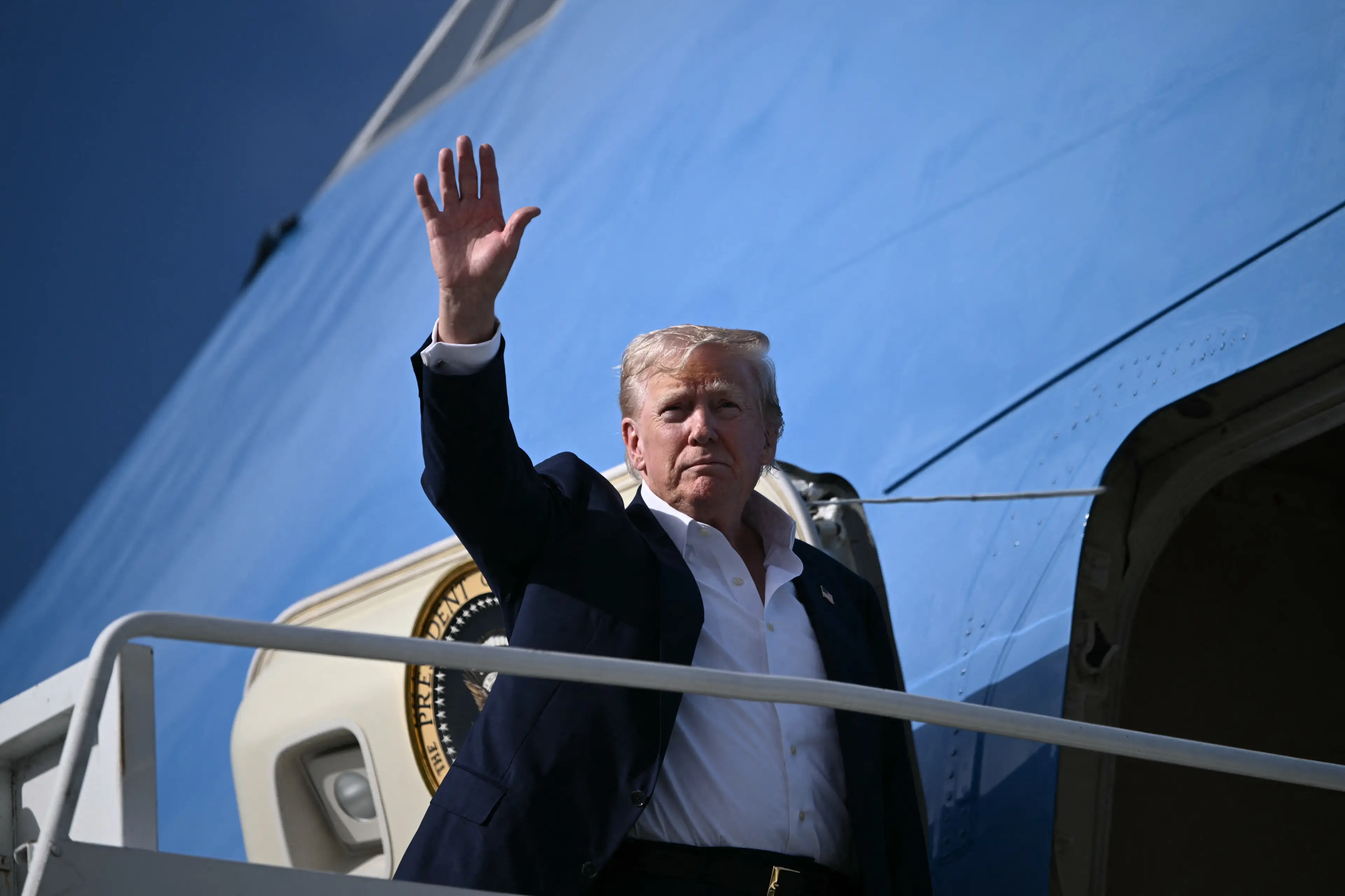 Trump spoke to reporters aboard Air Force One (BRENDAN SMIALOWSKI/AFP via Getty Images)