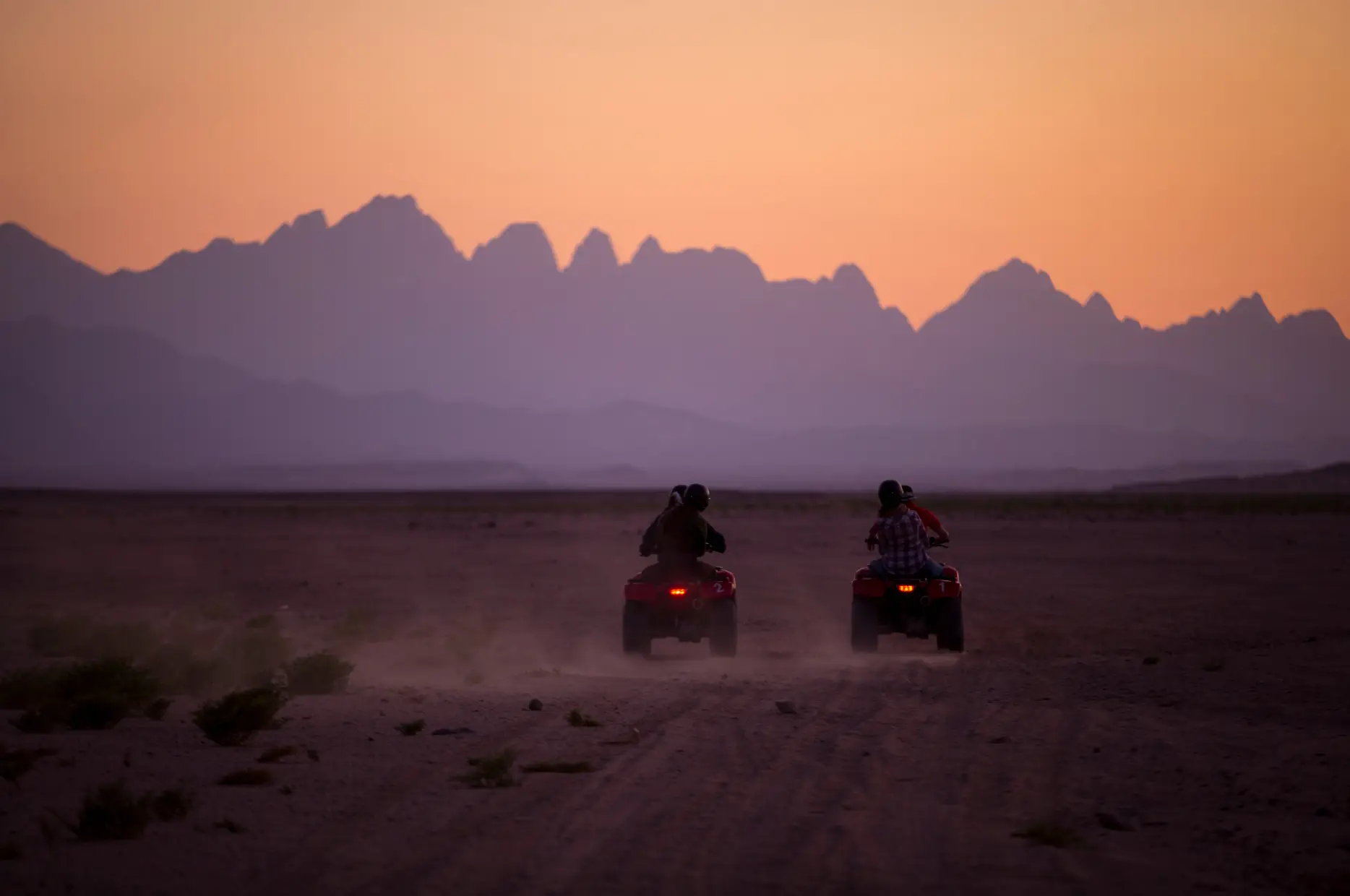 Alex Safari hosts sunset quad biking in the desert