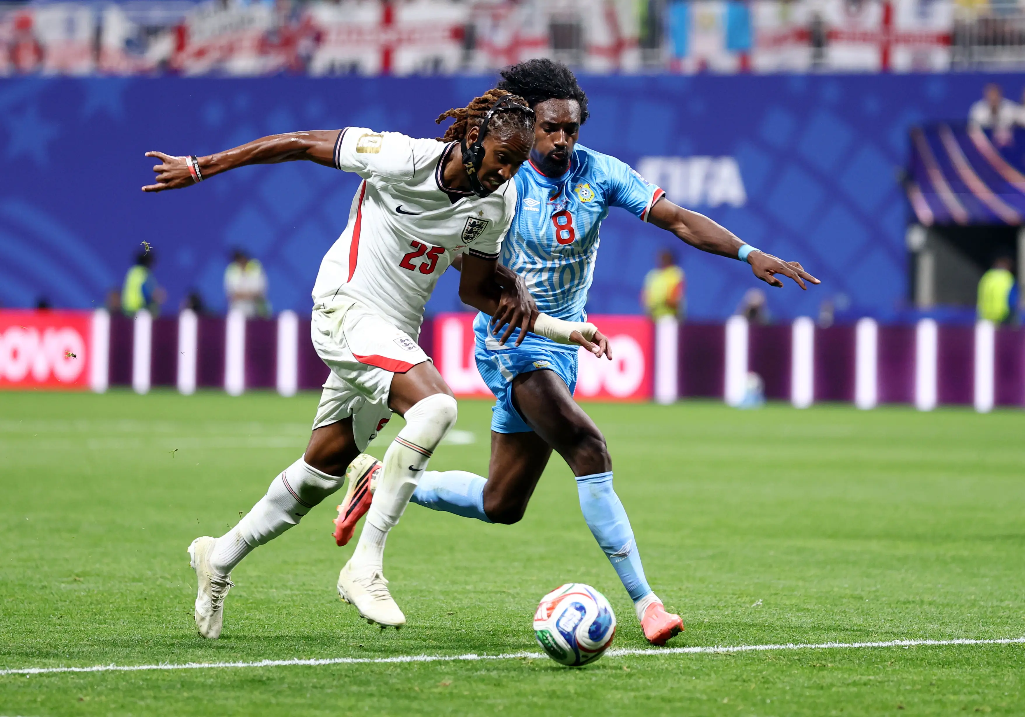 Djed Spence tussles with DR Congo's Samuel Moutoussamy at the FIFA World Cup (Megan Briggs/Getty Images)