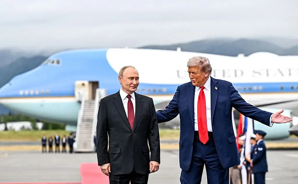 Onlookers reported seeing Putin limping as he went to greet Donald Trump recently (Photo by Kremlin Press Service / Handout/Anadolu via Getty Images)