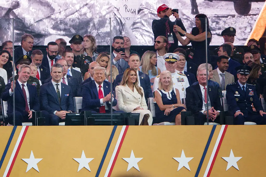 The former model appeared smiling and engaged at some moments (Kevin Carter/Getty Images)