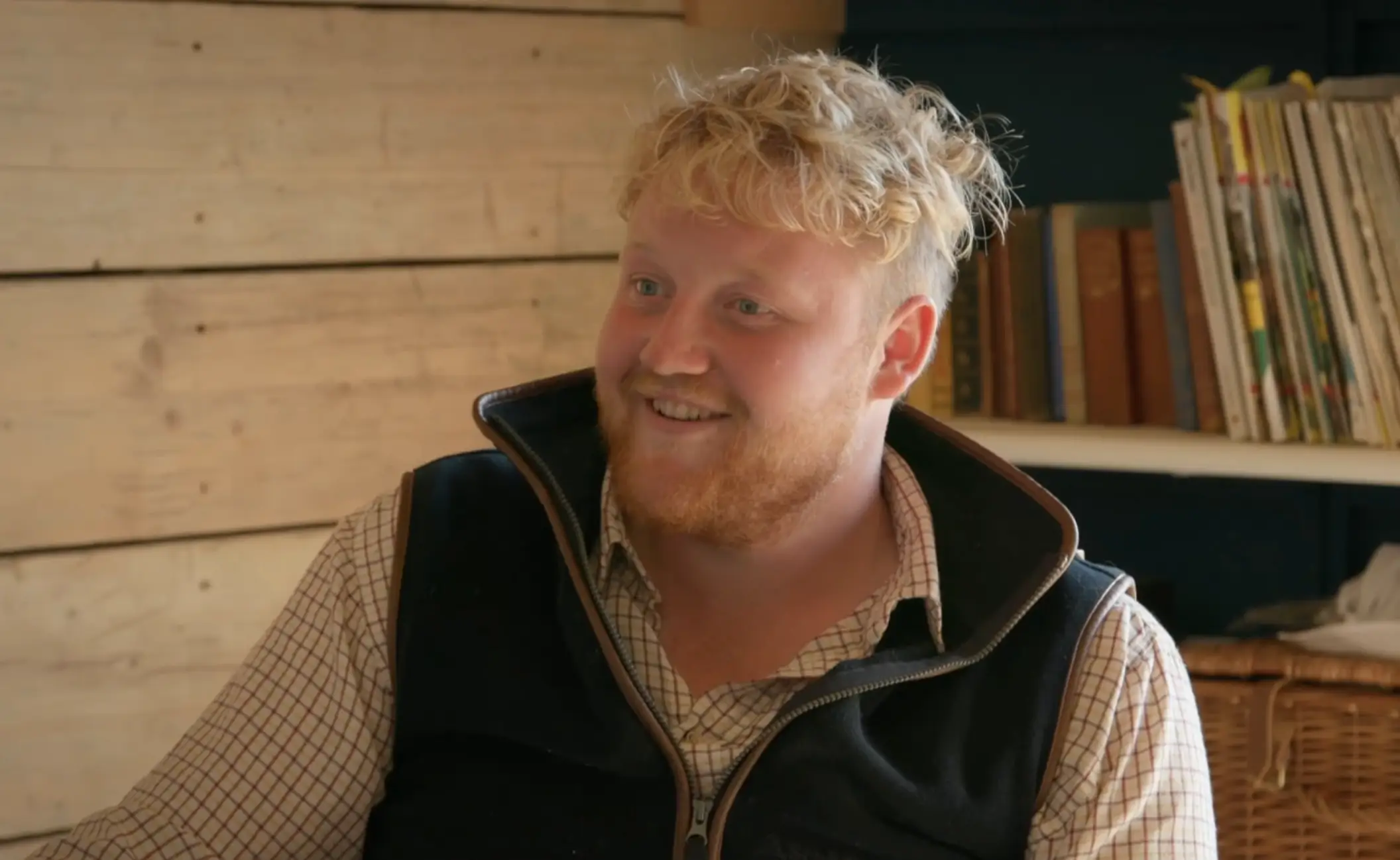 Kaleb buzzing with his new job. (Prime Video)