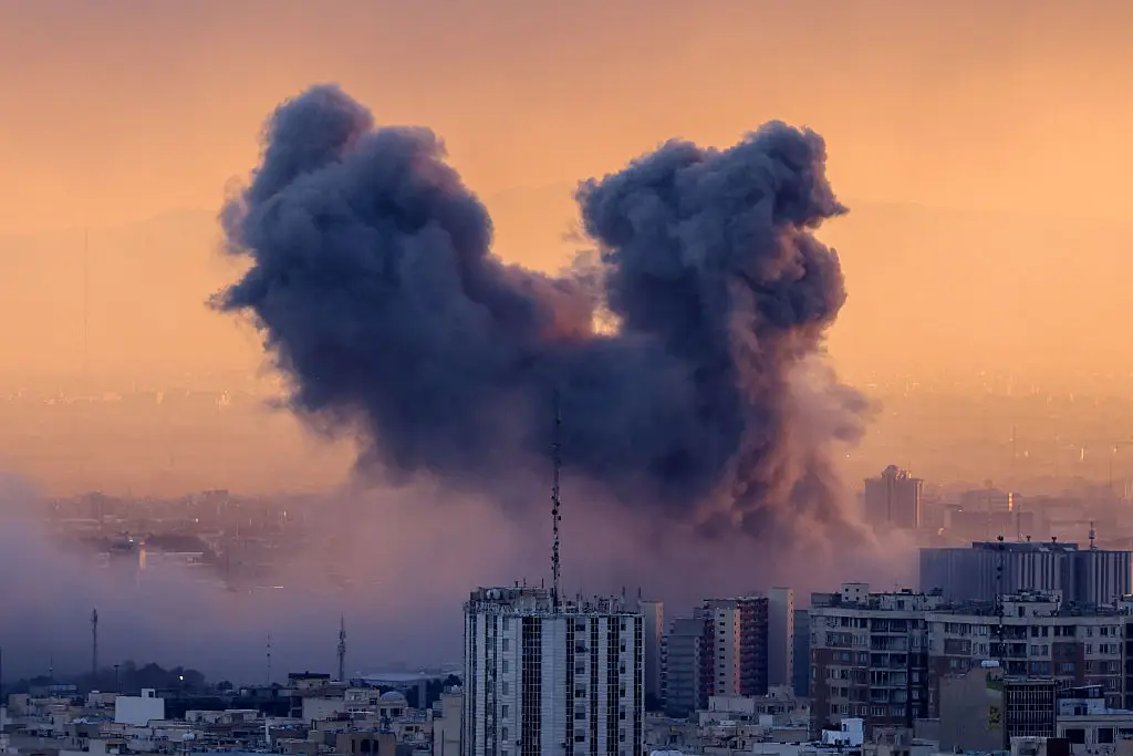 Israel has launched a 'wave of strikes' on Tehran (ATTA KENARE / AFP via Getty Images)
