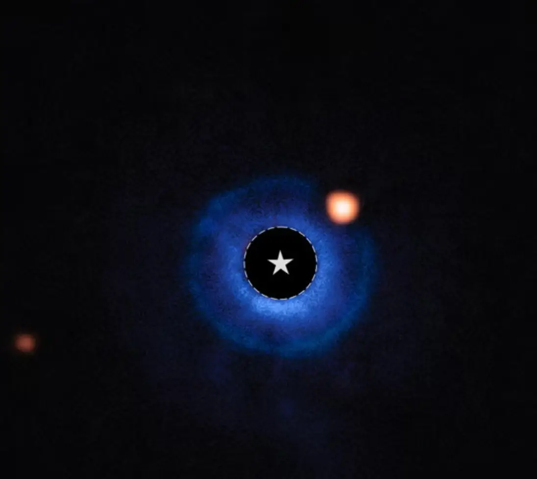The exoplanet (orange) was found in the debris disk (blue) of a young star named TWA 7 (NASA, ESA, CSA, Anne-Marie Lagrange (CNRS, UGA), Mahdi Zamani (ESA/Webb))