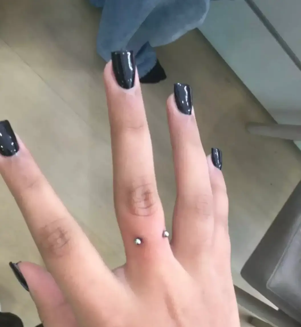 The pre-teen's finger piercing has proved to be very controversial among fans of the Kardashians (TikTok/@kimandnorth)
