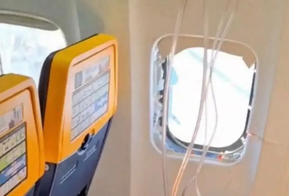 Images circulating online showed how the plane window had become 'dislodged' during the flight (X)