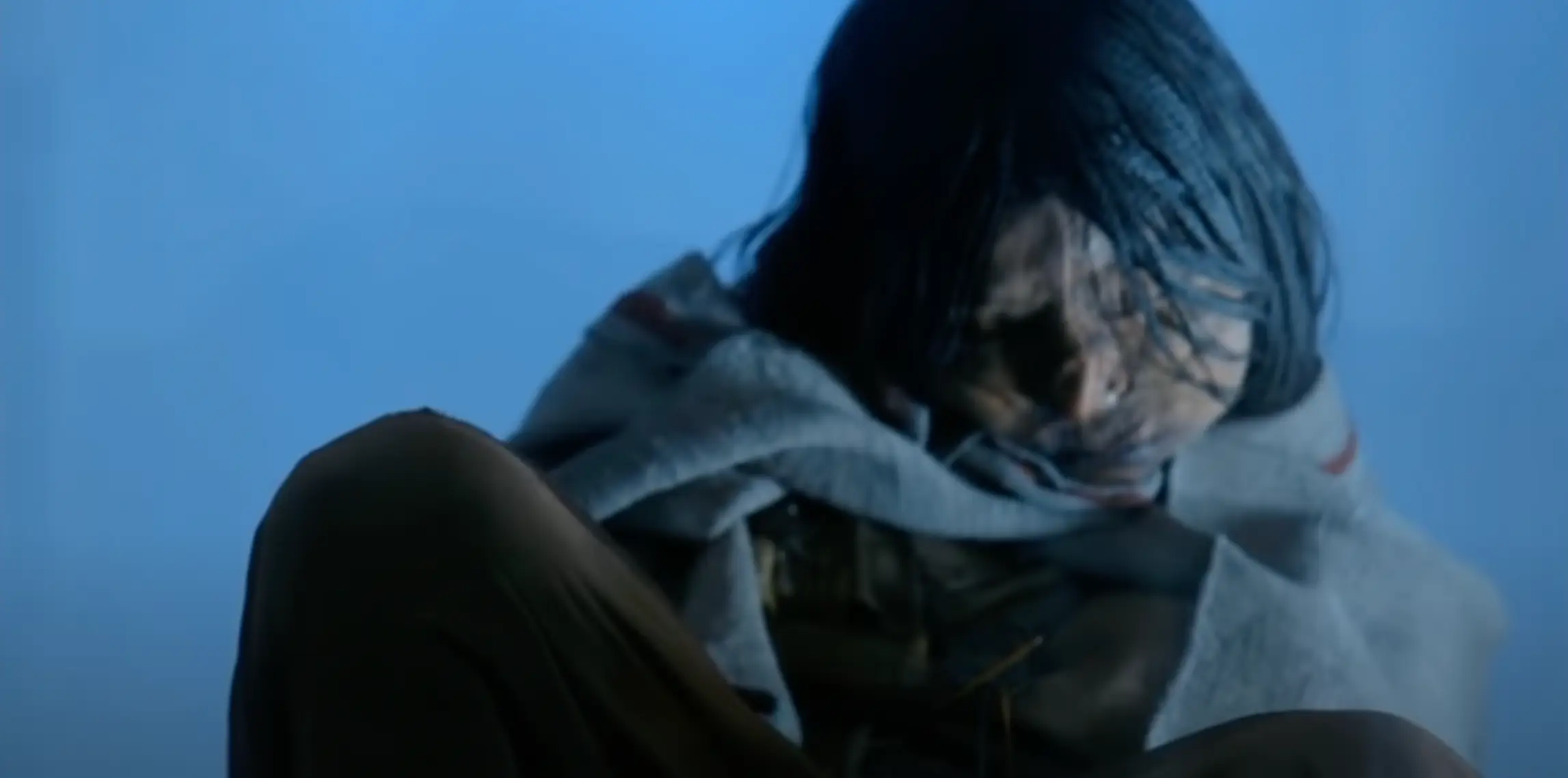 The young girl looks almost like she's sleeping.