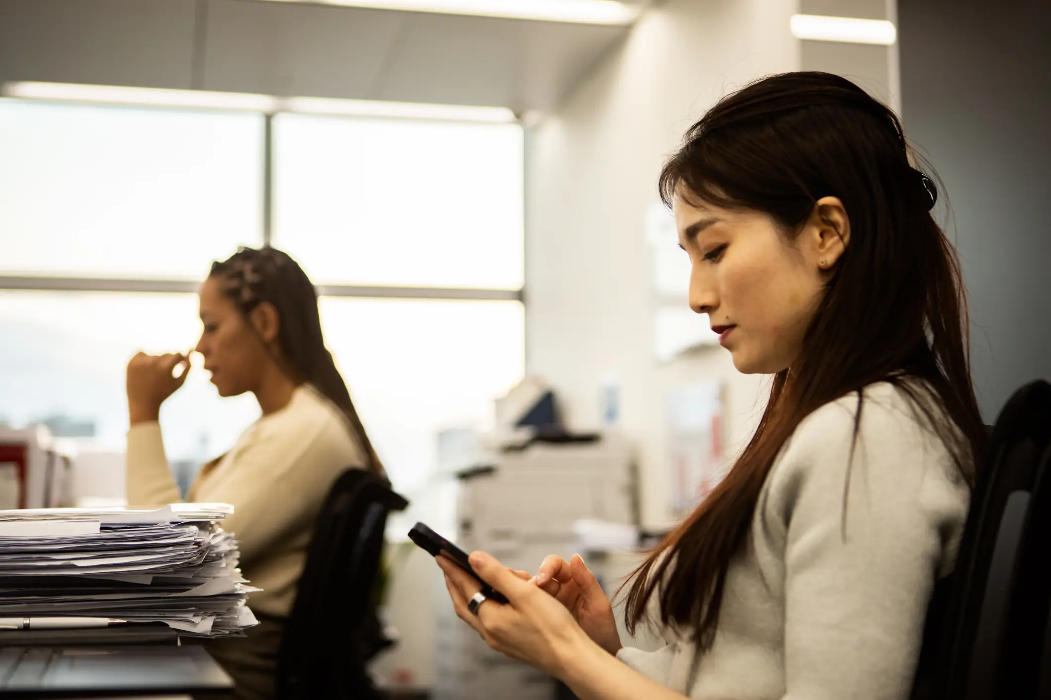"We sit right next to each other, just tell me without typing." (Getty Stock Photo)