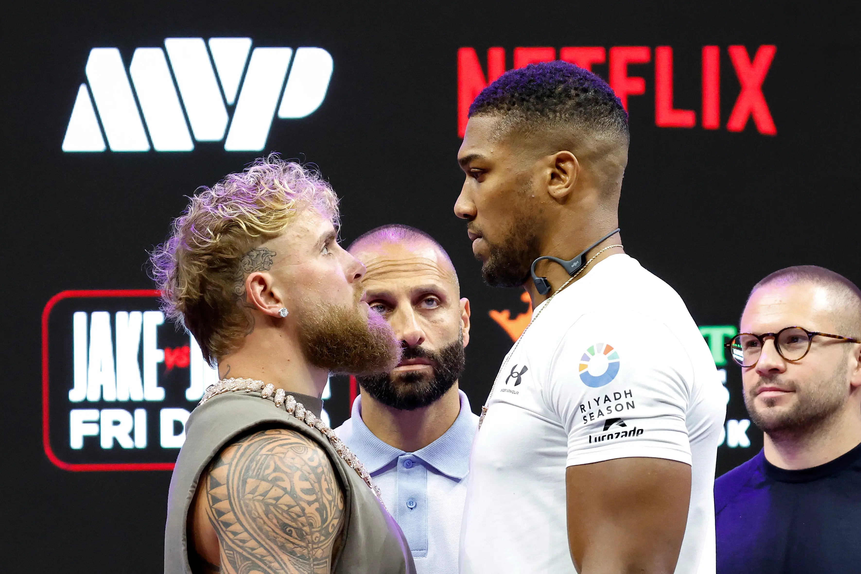Joshua - who stands at 6ft 6ins tall - towered over his 6'1 opponent (Eva Marie Uzcategui/Getty Images for Netflix)