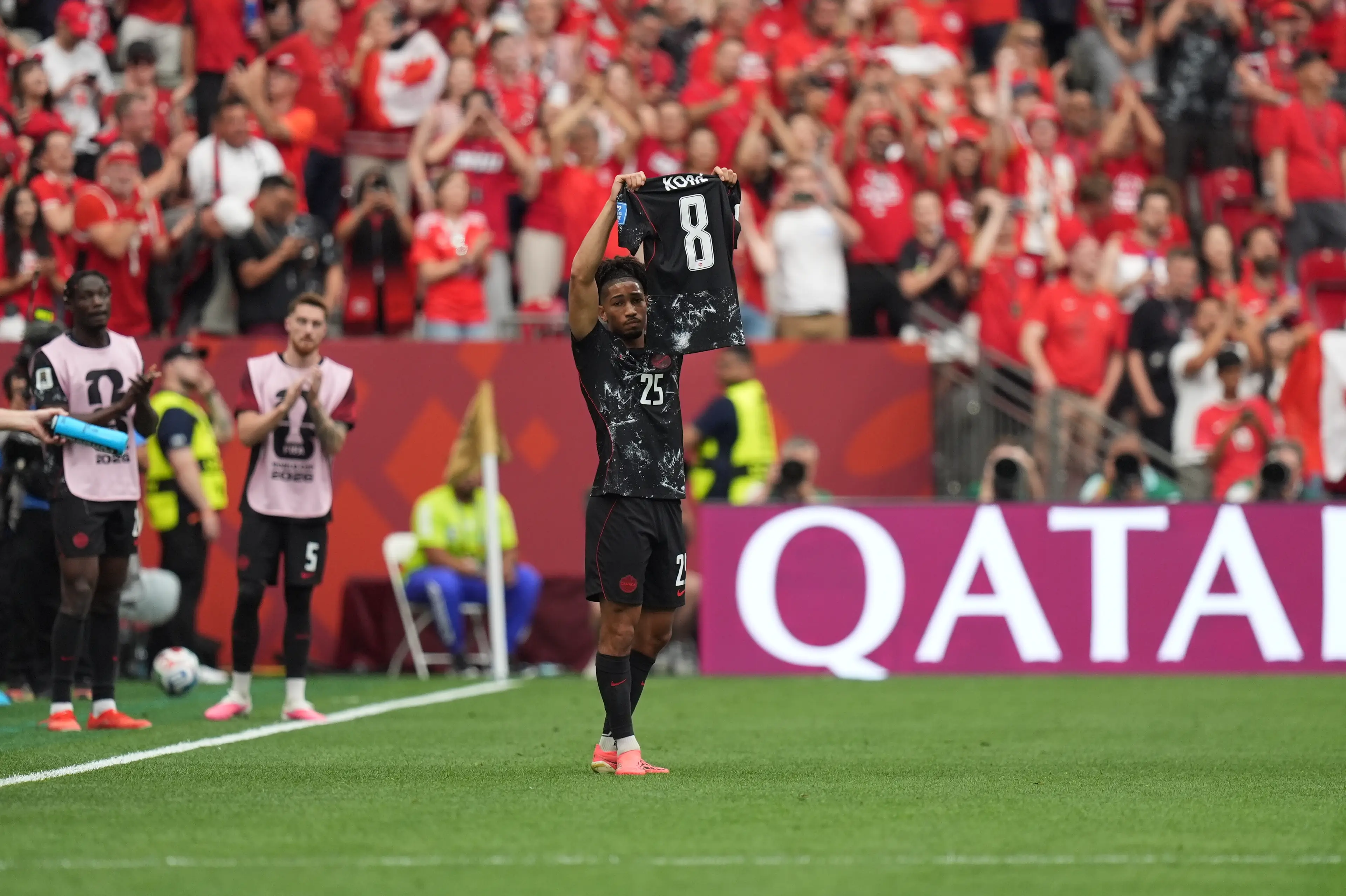 William Saliba held up Kone's shirt after scoring. (Ercin Erturk/Anadolu via Getty Images)