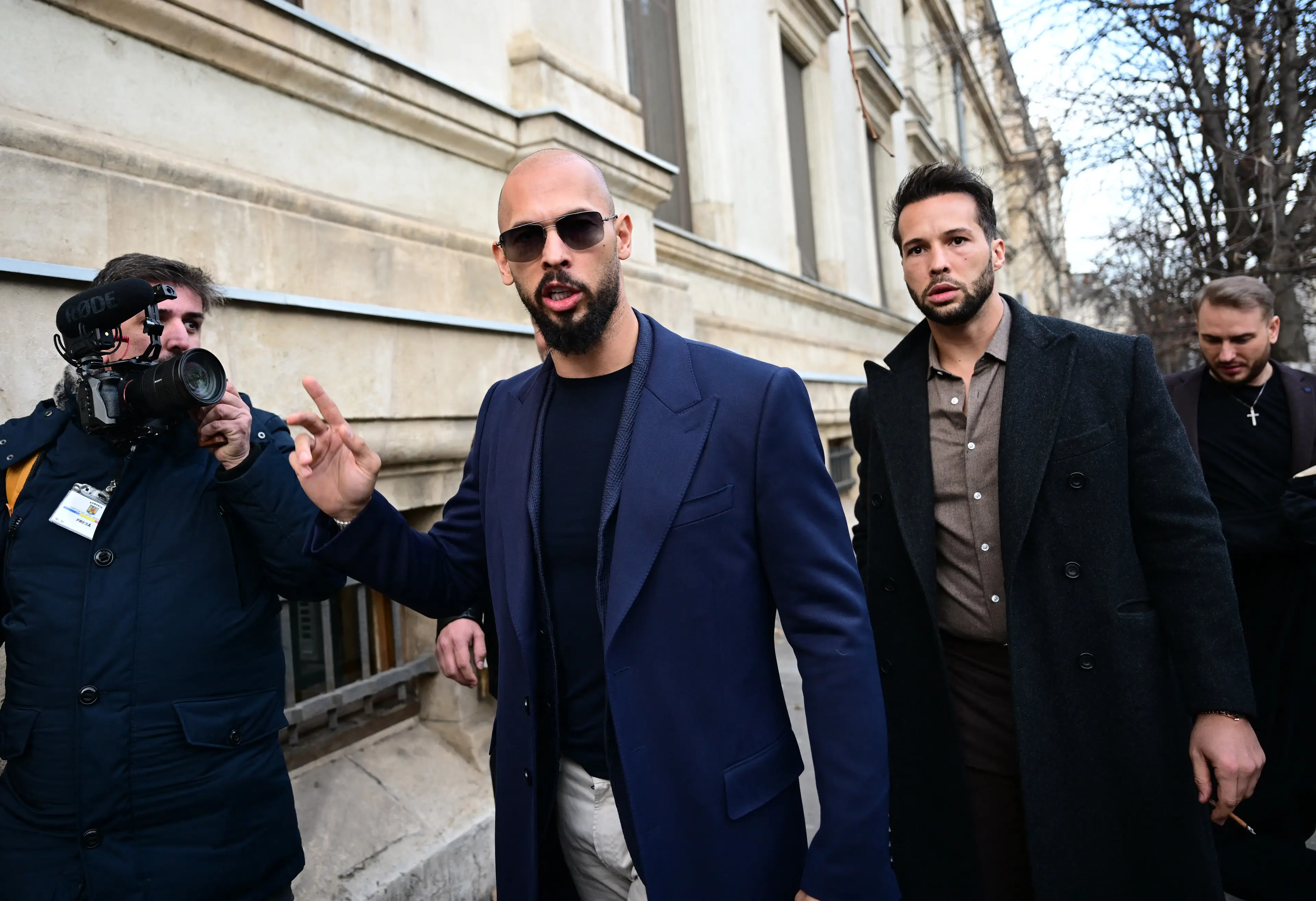 The brothers face multiple allegations. (DANIEL MIHAILESCU/AFP via Getty Images)