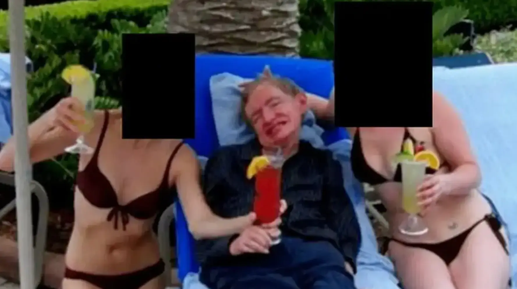 Stephen Hawking was pictured with two women in bikinis (DOJ)