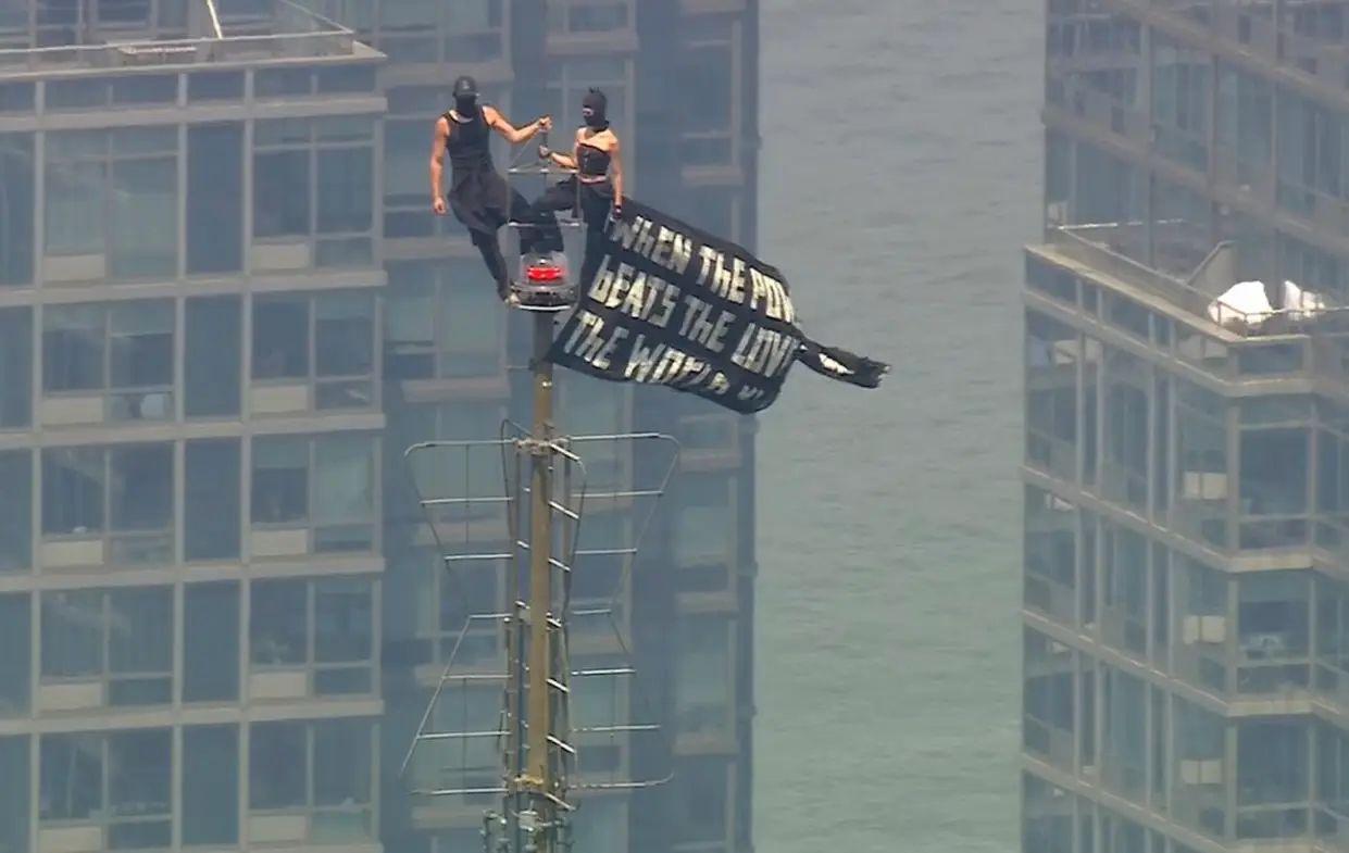 The pair were arrested by NYPD officers in wake of the stunt (WABC)