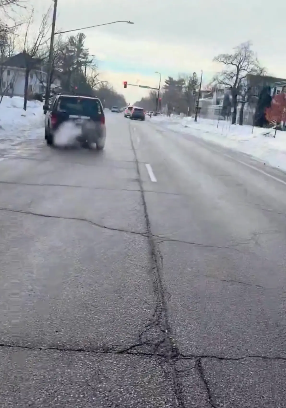 The car skidded away before crashing into parked cars down the street (Alpha News)