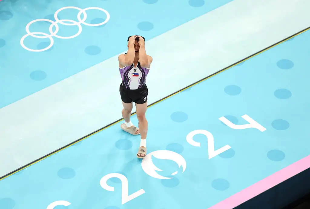 The gymnast couldn't believe he had won his second gold medal of the games. (Dan Mullan/Getty Images)