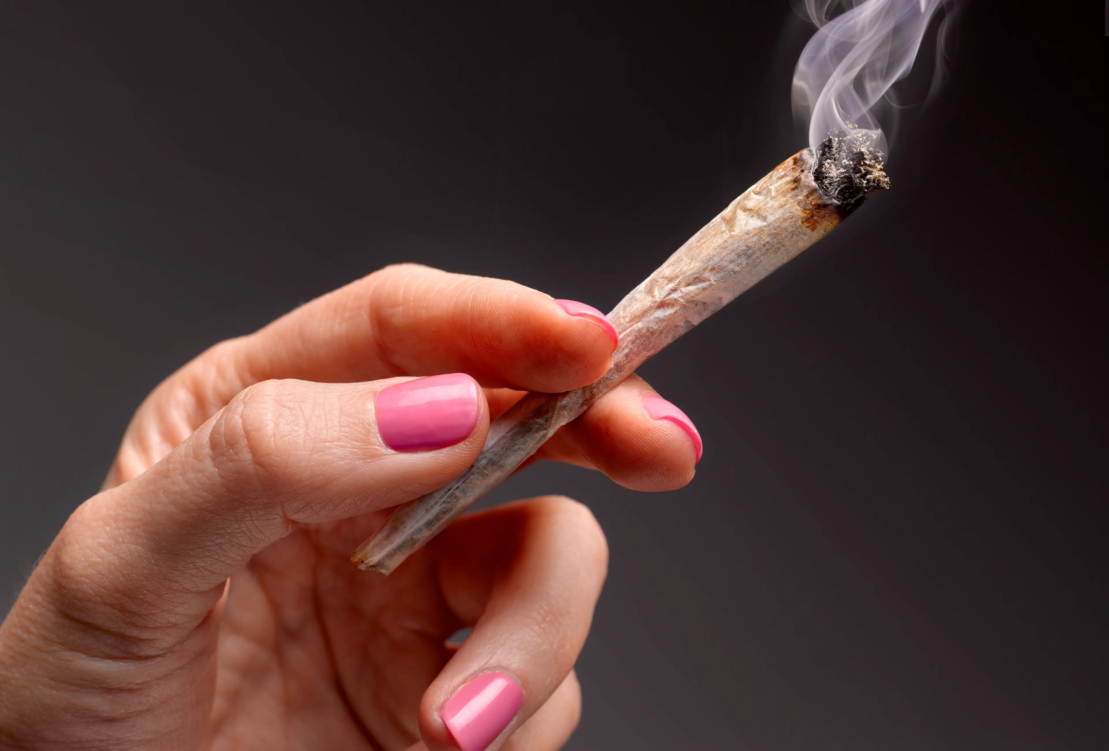 Those partial to puffing a joint will likely experience withdrawal symptoms when they stop (Getty Stock Image)