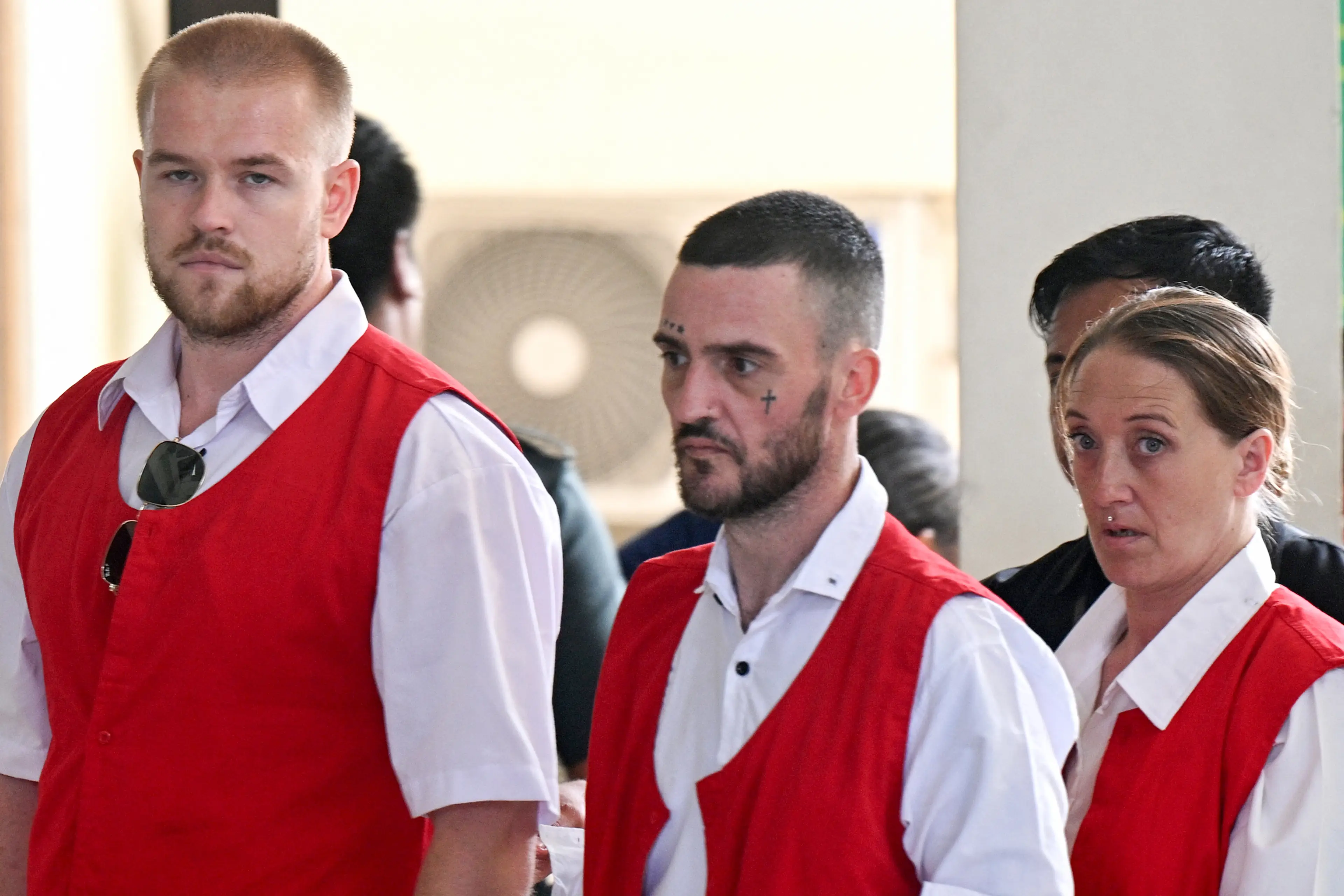 The British trio claim they did not know they were transporting cocaine (SONNY TUMBELAKA/AFP via Getty Images)