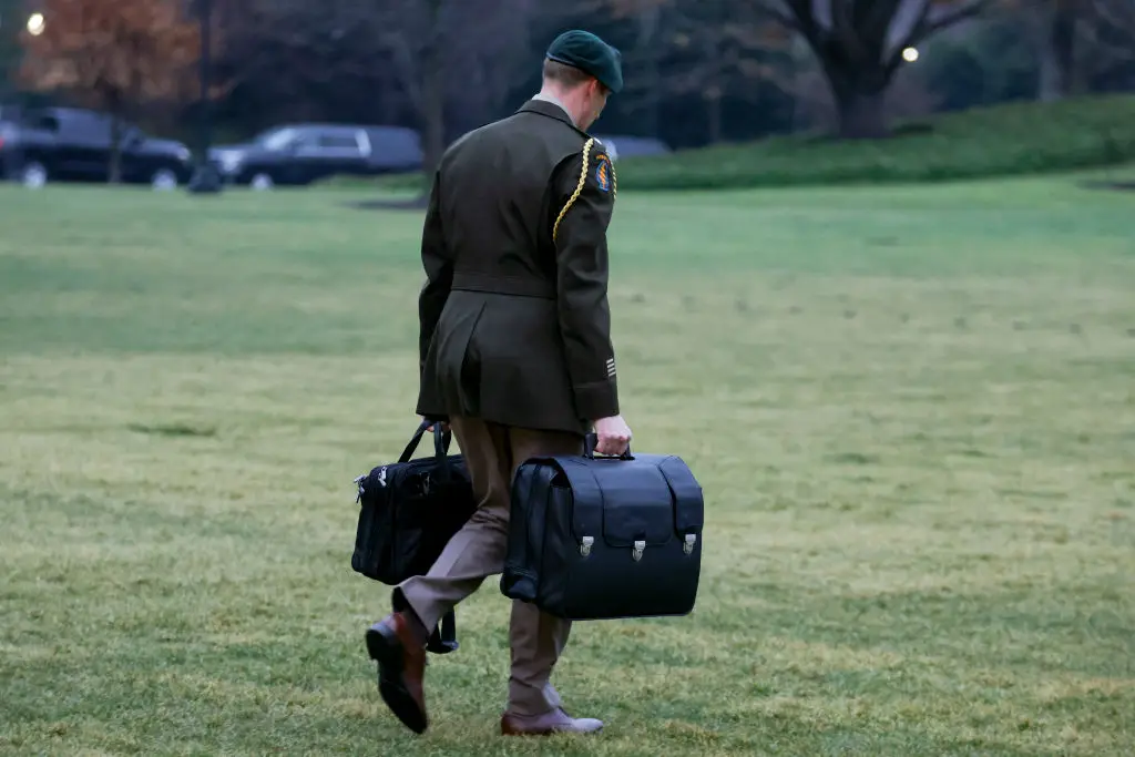 Where the president goes, the nuclear football follows (BRYAN DOZIER/Middle East Images/AFP via Getty Images)