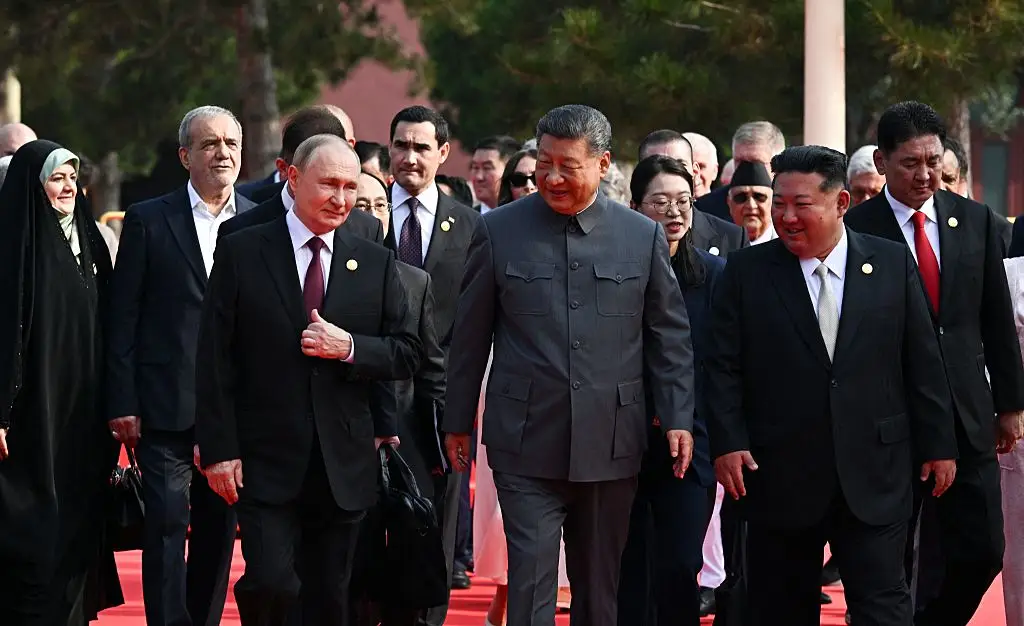 The trio were seen standing side-by-side at China's historic parade (SERGEY BOBYLEV/POOL/AFP via Getty Images)
