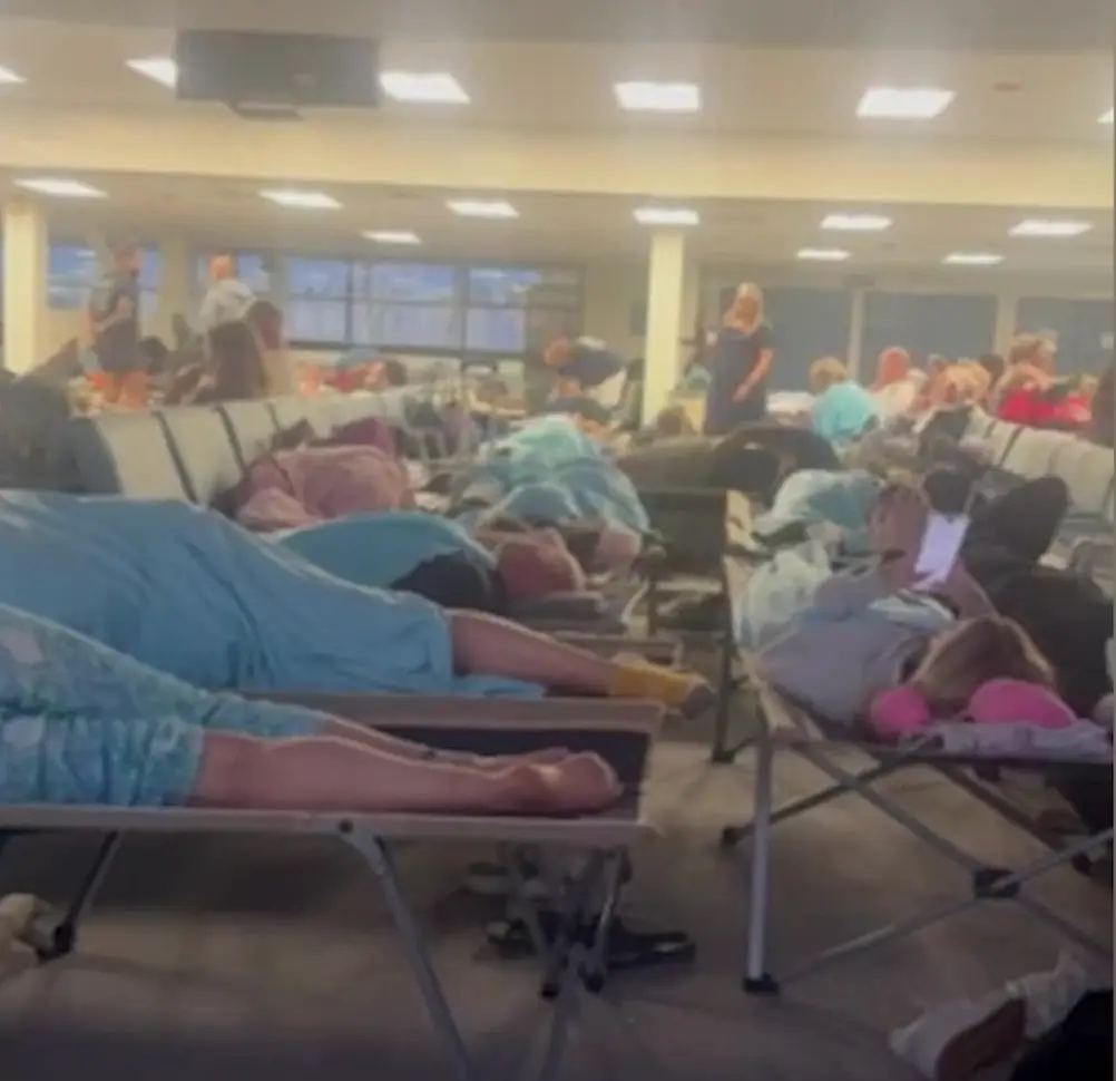 Passengers were forced to wait for a new crew at the airport in Maine (SWNS)