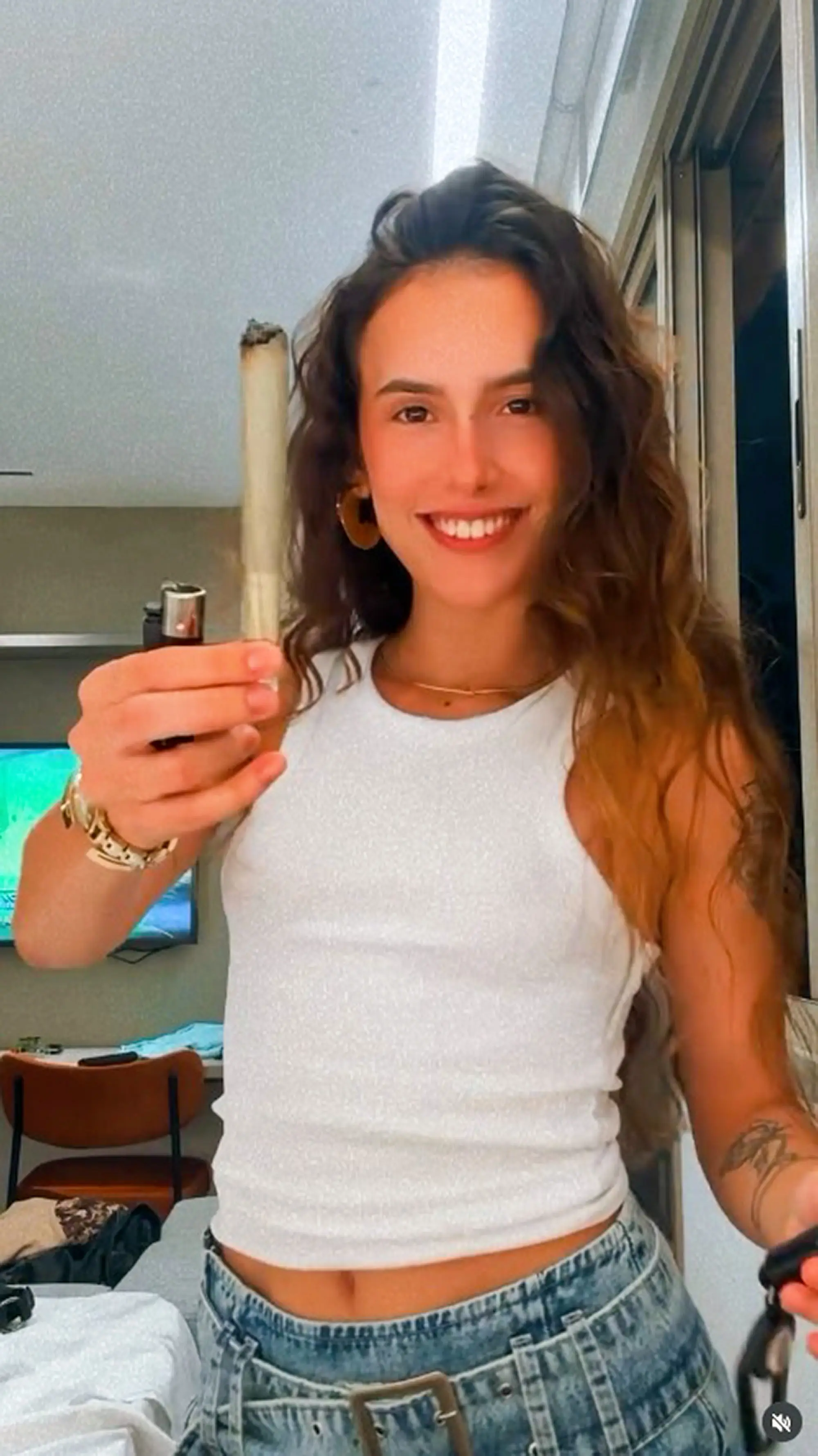 The 23-year-old, who promotes smoking weed online, has denied all charges against her (NewsX)