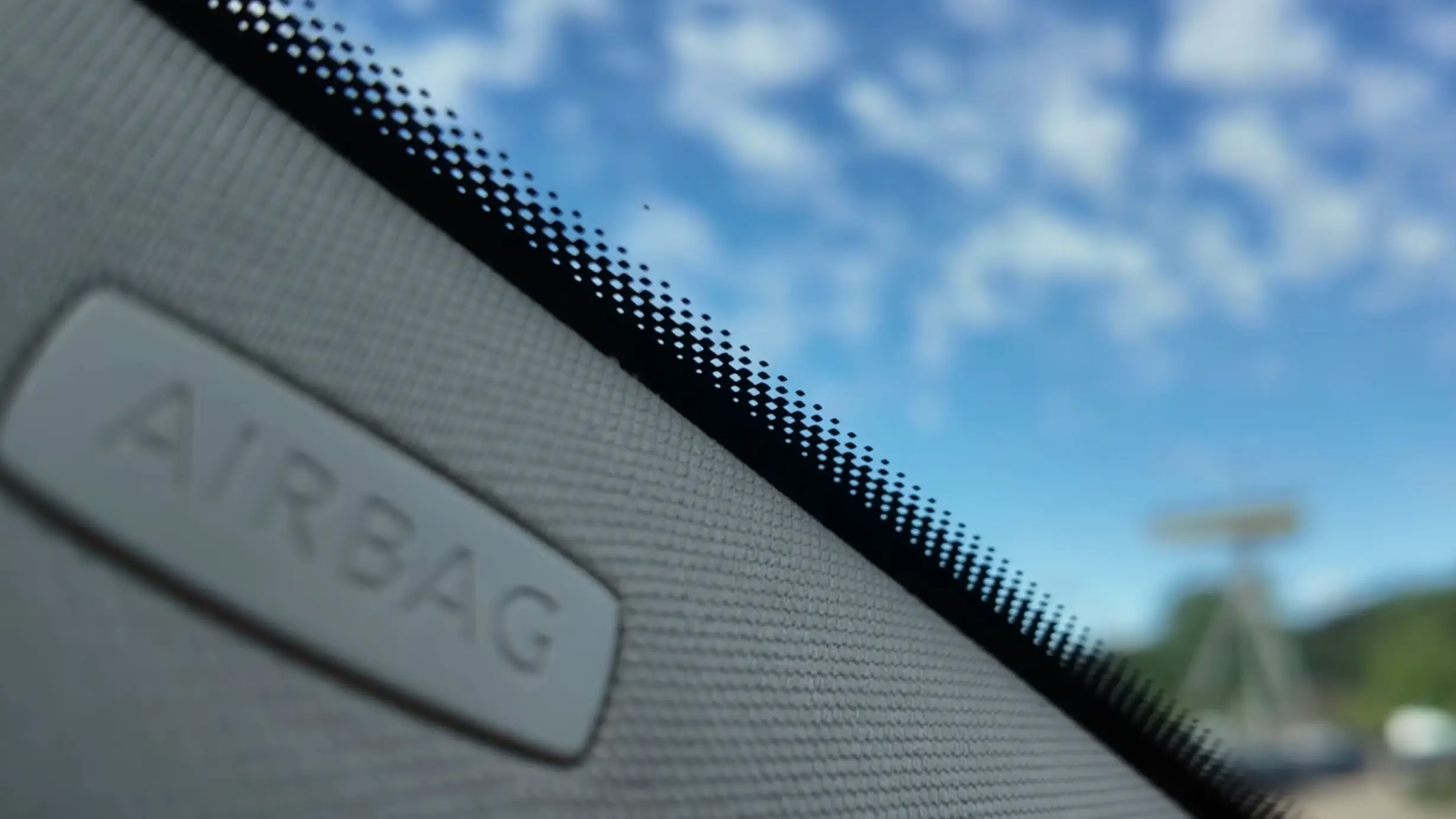 What black dots on your car windscreen are actually there for