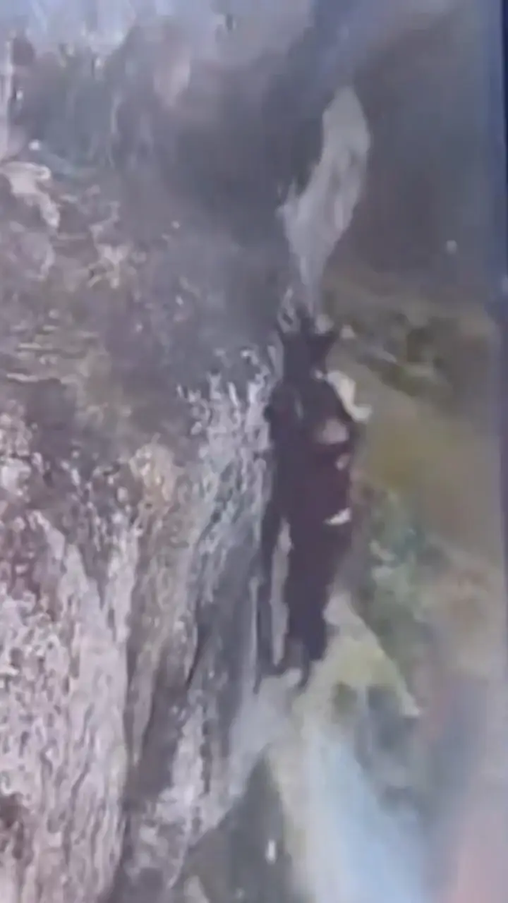 He was seen battling to regain his grip after falling from the summit (Newsflash)